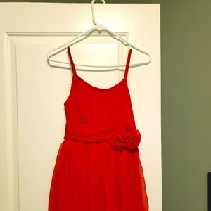 Red dress with floral bow